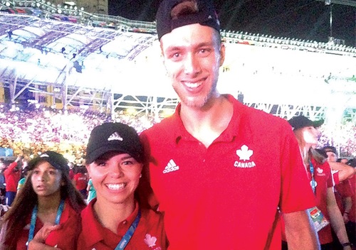 Michelle Wood (Team Canada W-Volleyball assistant coach and Acadia head coach) and Nissen at opening ceremonies of FISU Games.